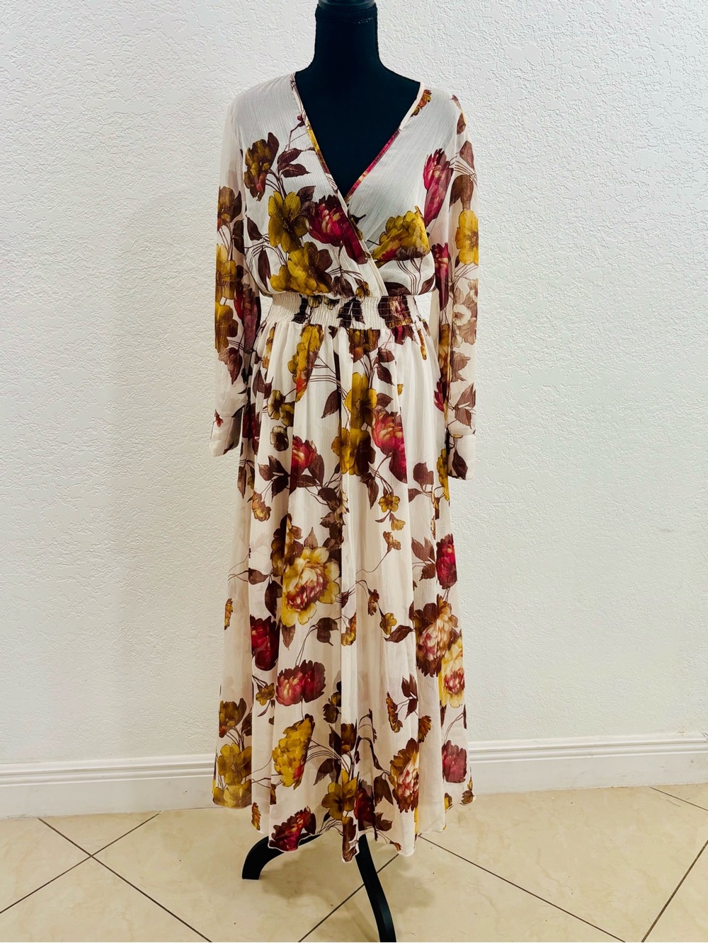 Alexa B Nites Floral Maxi Dress features a cream backdrop adorned